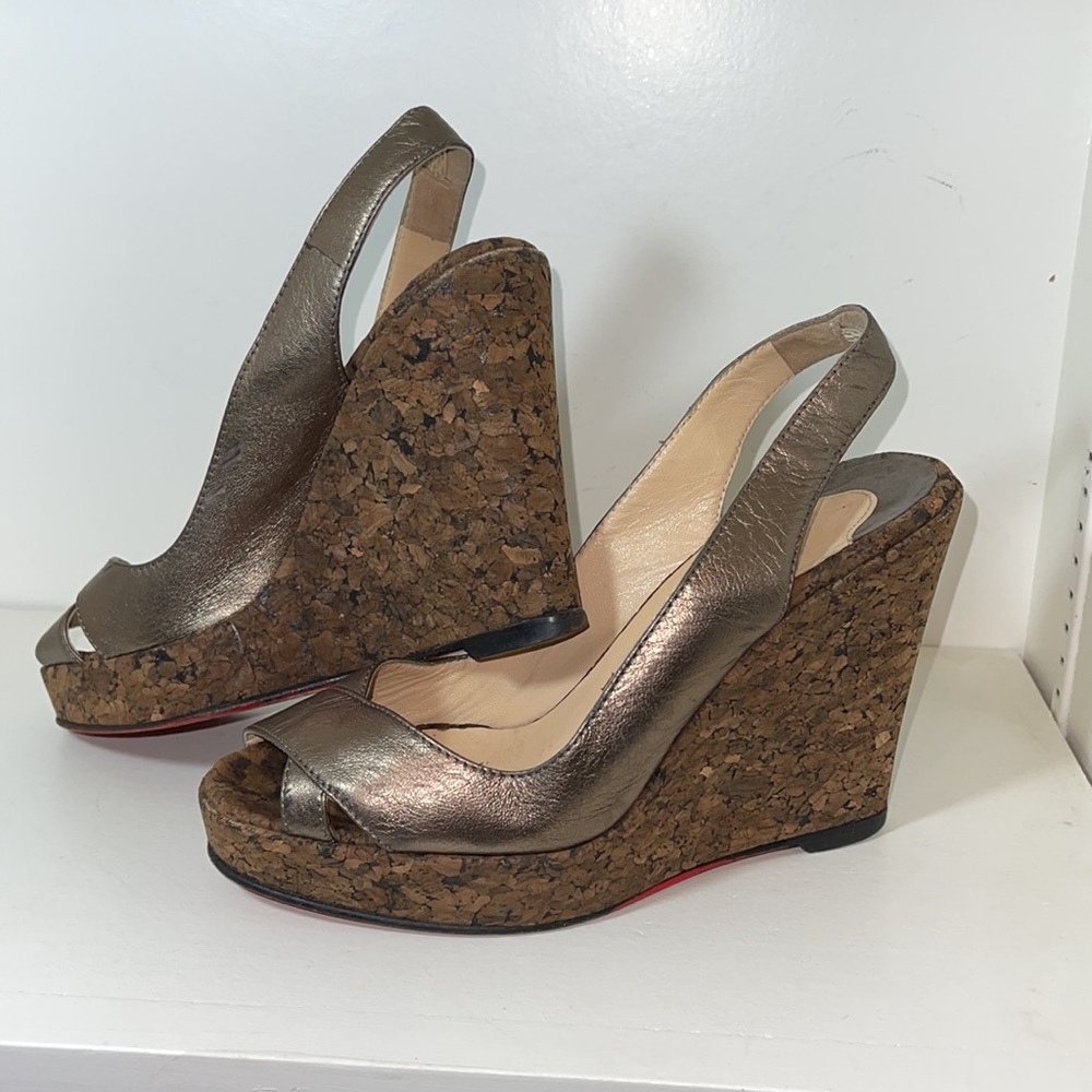 Women’s Christian Louboutin cork wedge. Size 38.5/ 8.5.